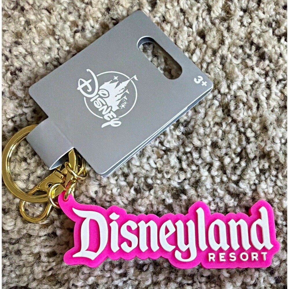 Disney Parks Disneyland Resort Pink Logo Mania Fantasyland Feels Keychain NWT